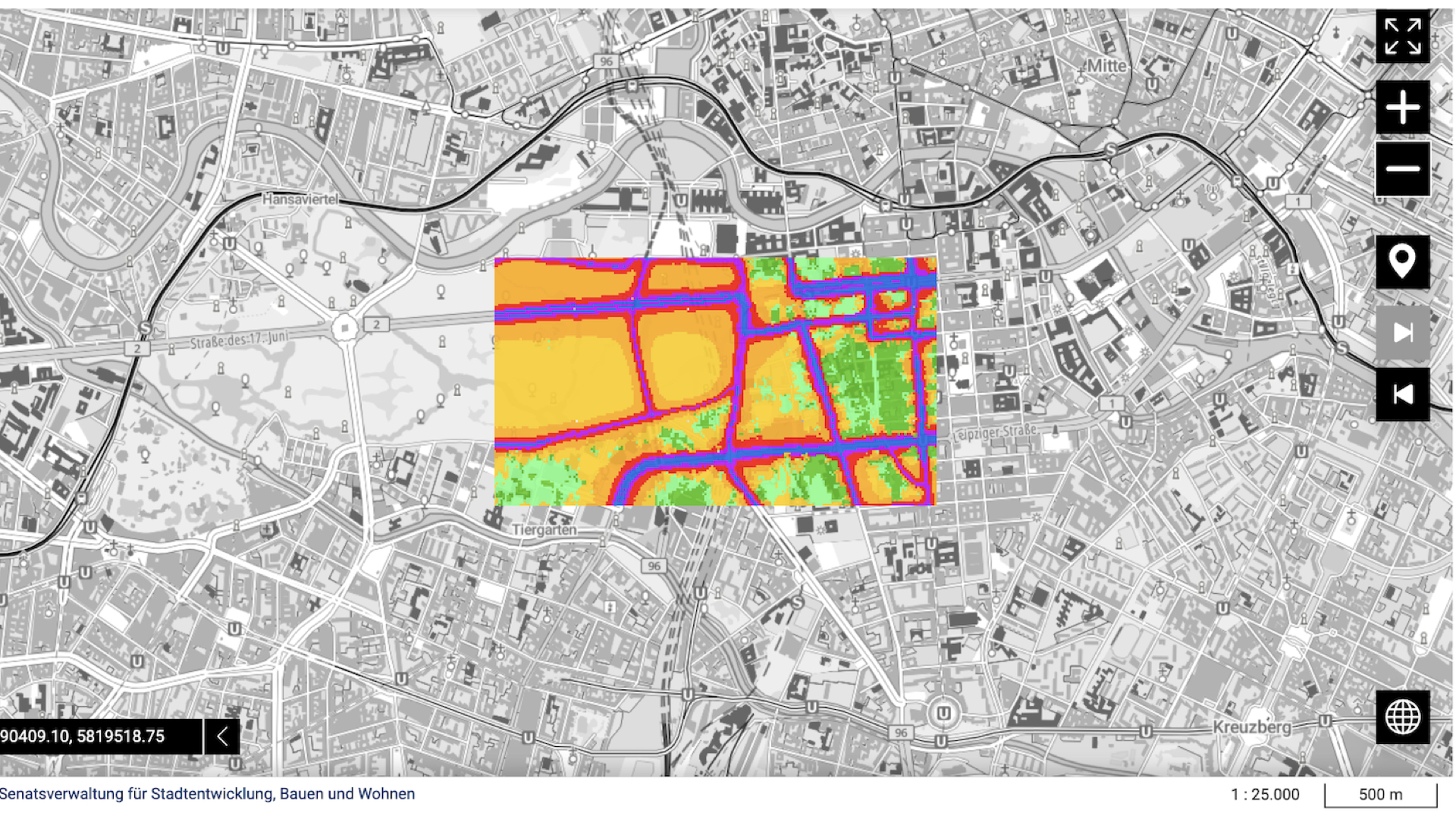 This is a picture of a partial noise map as the colours slowly grow over a ground map of the city of Berlin.